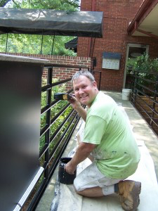 Doug Cifers of Economical Painting Company painting at a Raleigh area property
